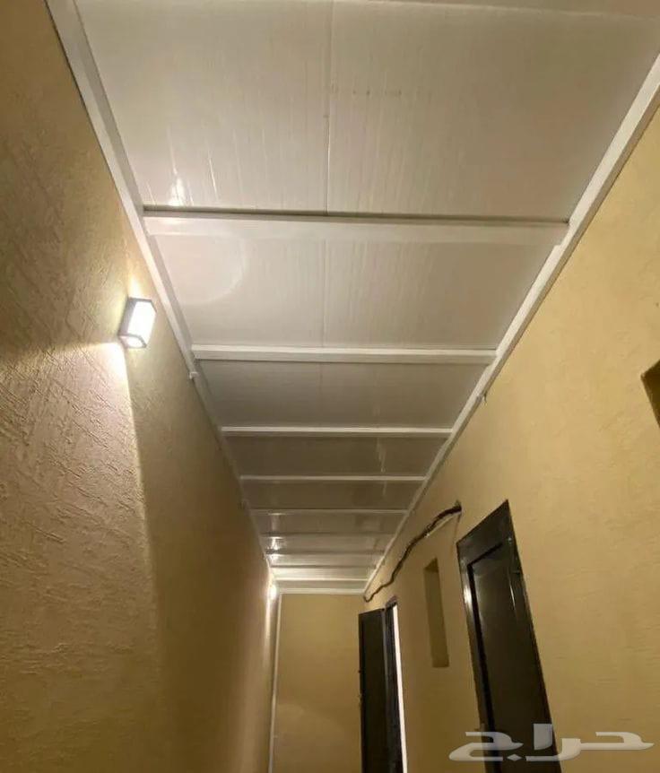 Haddad Haddad and awnings and sweaters64192621307906114