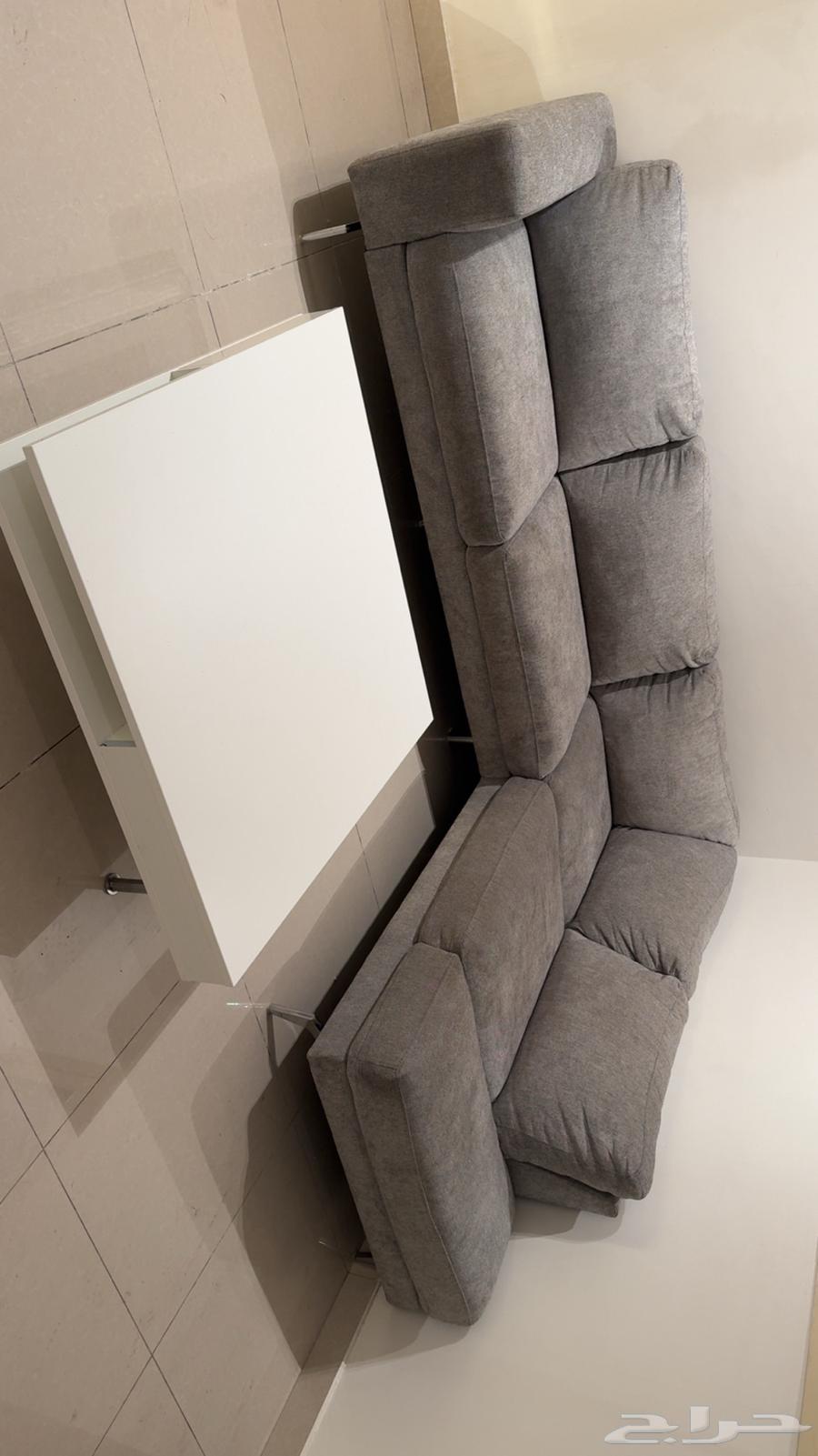 Four-seat corner sofa from Abwath, white table from IKEA64209898234113112