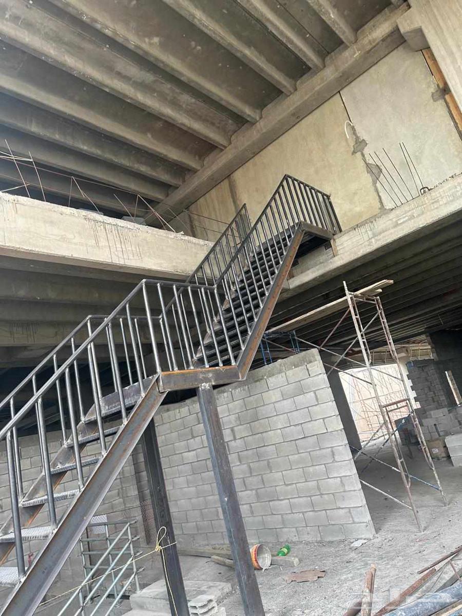 برجولات حديد وخشب ابواب شبابيك64210552242435113