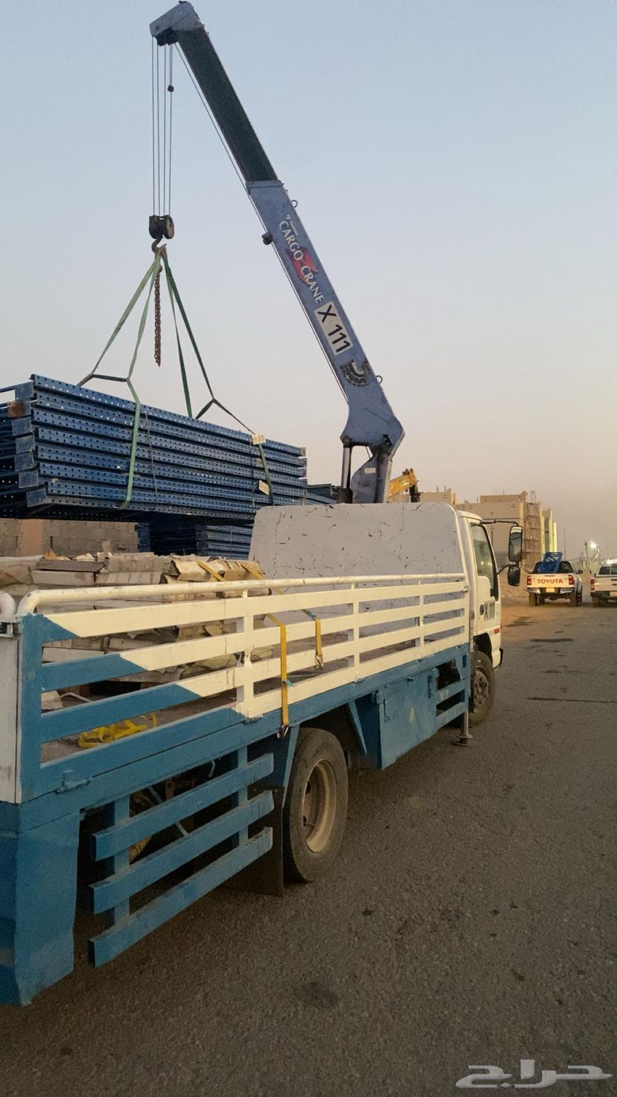 Loading crane for car storage with burned vehicles64212228217730110