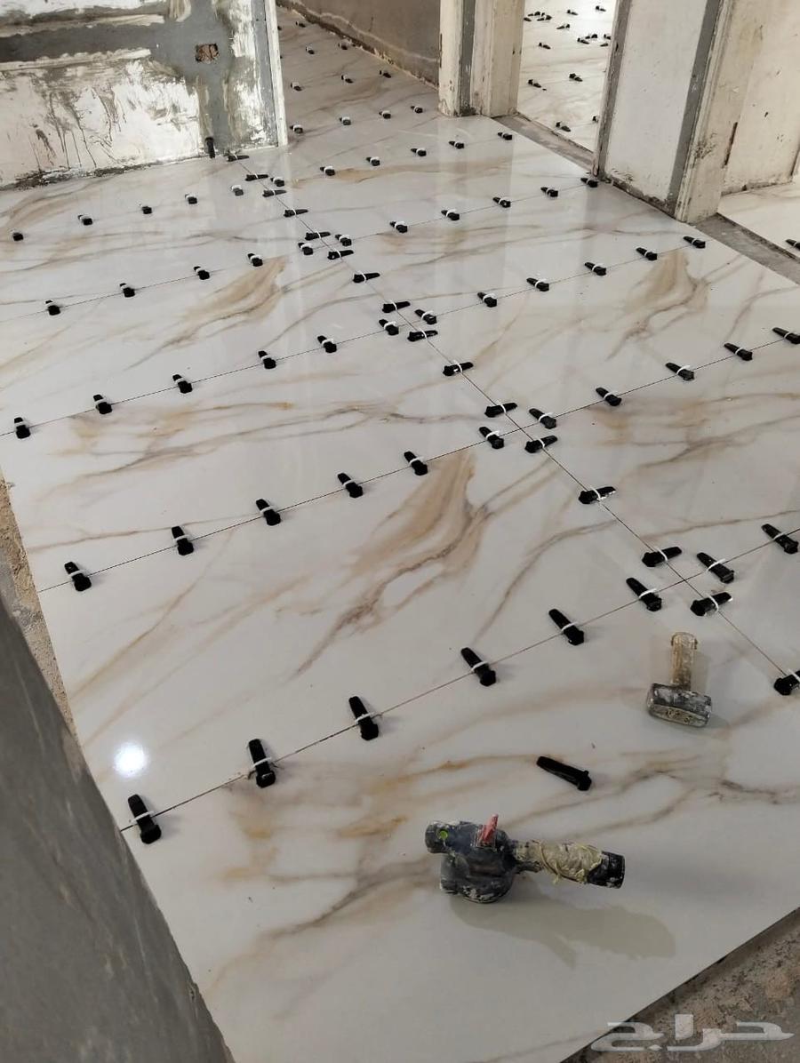 Porcelain ceramic tiler, breaking and installing porcelain64212645551874112