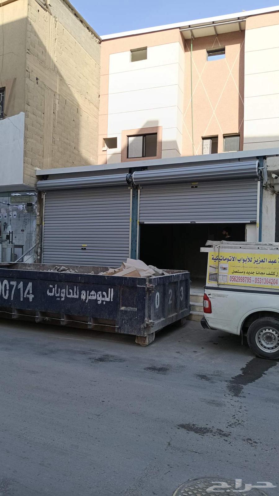 فني تركيب وصيانة الأبواب الأوتوماتيكية بالرياض64239967112322111