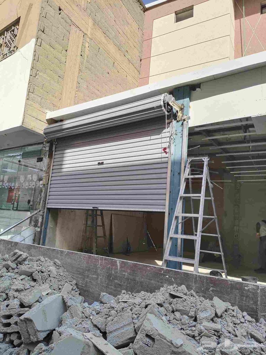 فني تركيب وصيانة الأبواب الأوتوماتيكية بالرياض64239967112322110