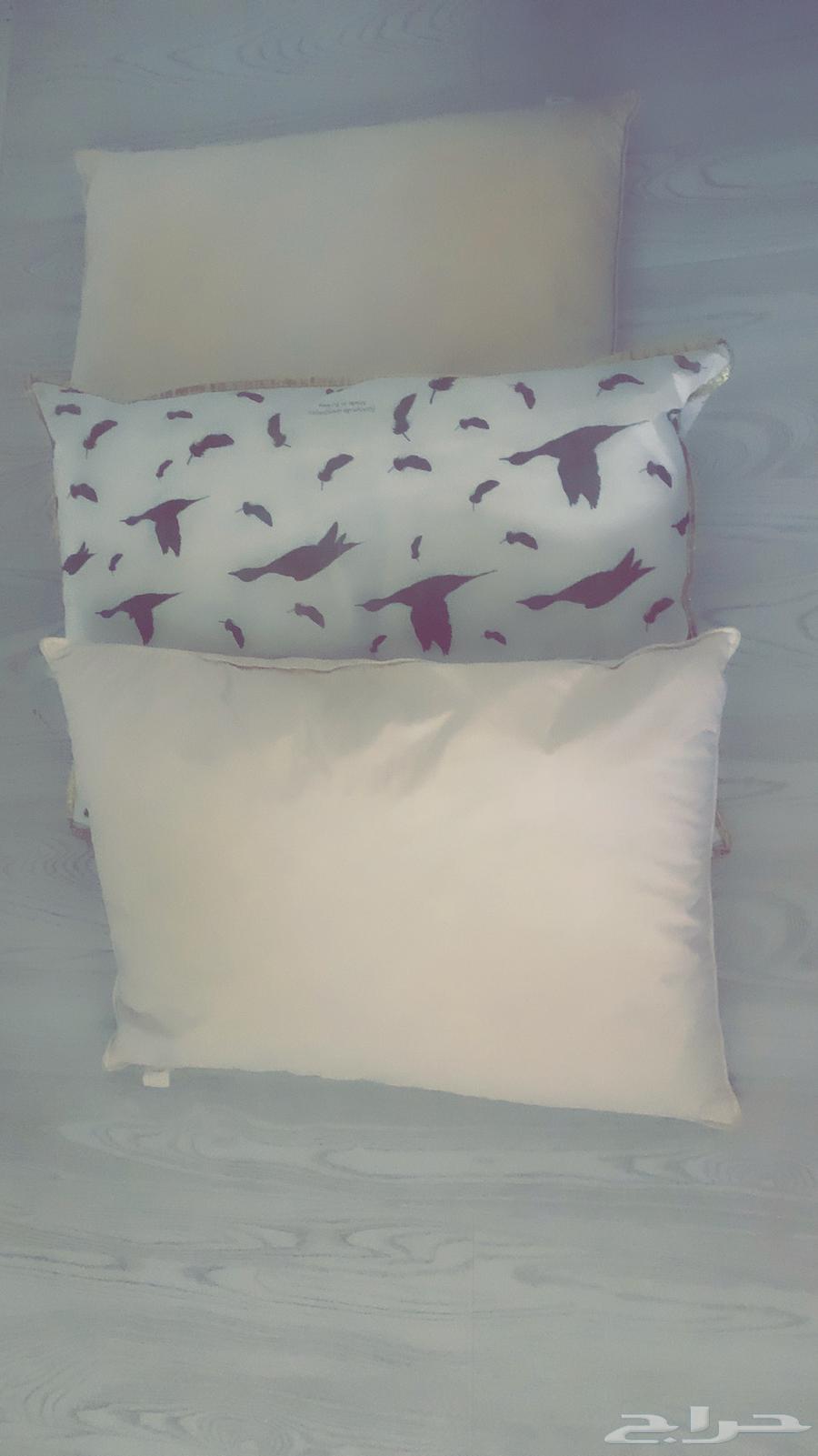 2 pillows filled with duck down from IKEA and the third from Home Centre64241148107009110
