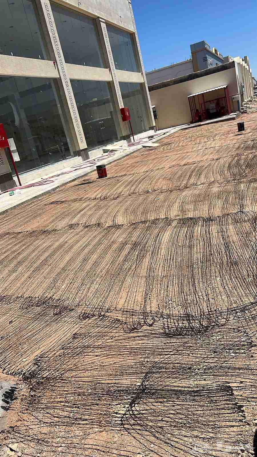 Asphalt in front of houses and shops64249941470850113