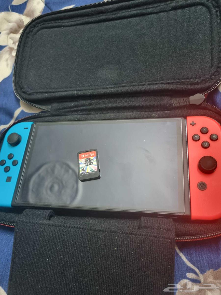 Nintendo Switch with Mario Party game64585906024961110