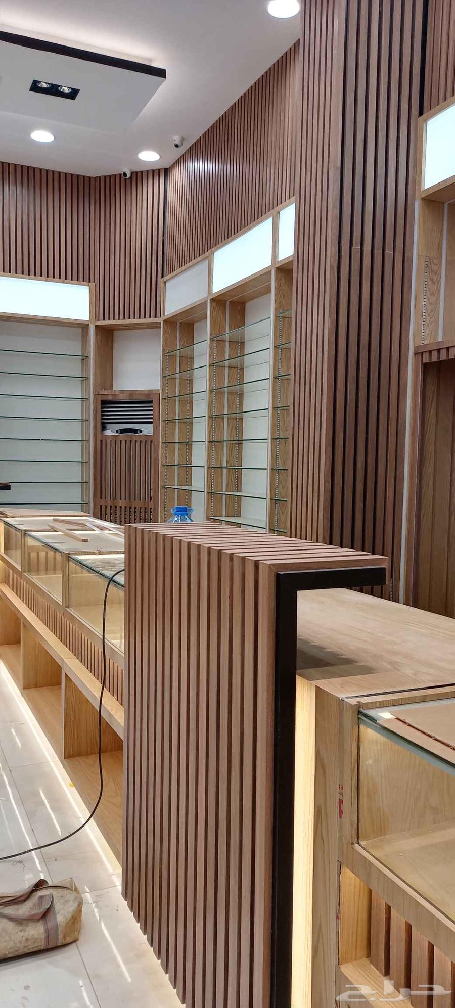 معلم نجار ديكورات للمحلات التجاريه وفنادق ولكفيهات64263794720515110