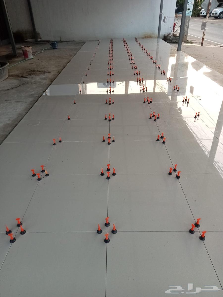 Pakistani tile installer, ceramic and porcelain, breaking and installing old and new64360149420161113