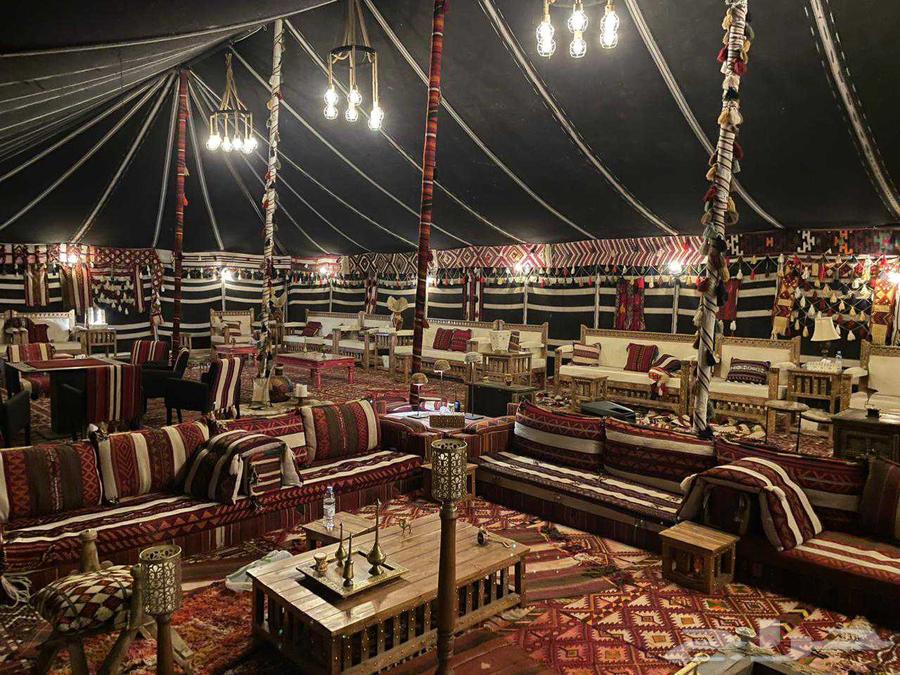 Desert camp setup, traditional tent installation, royal tent assembly and draping64380041325699110