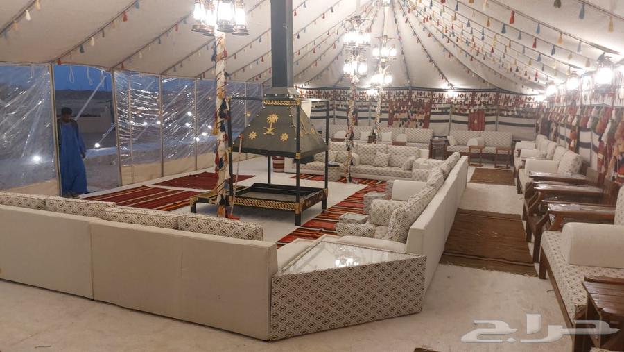 Desert camp setup, traditional tent installation, royal tent assembly and draping64380041325699112