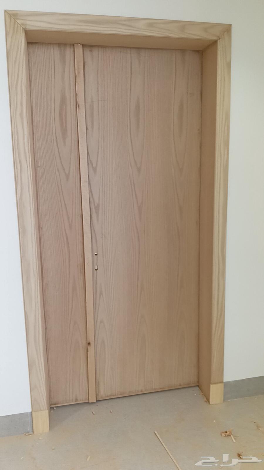 Carpenter wood doors but with shiny walnut in the middle of the water clean work64458039267586114