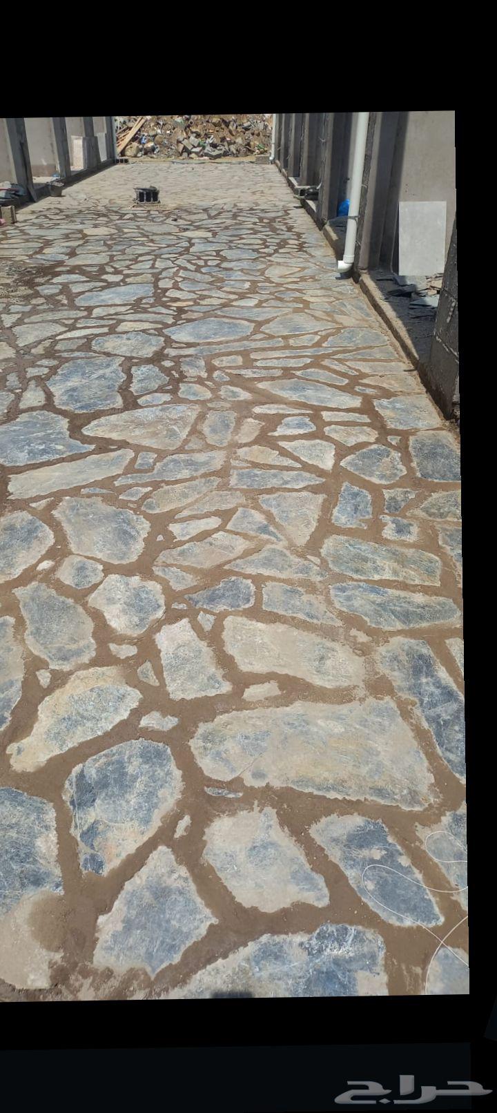 Stone mason with all types of stone, large and small, cladding64458102947202112