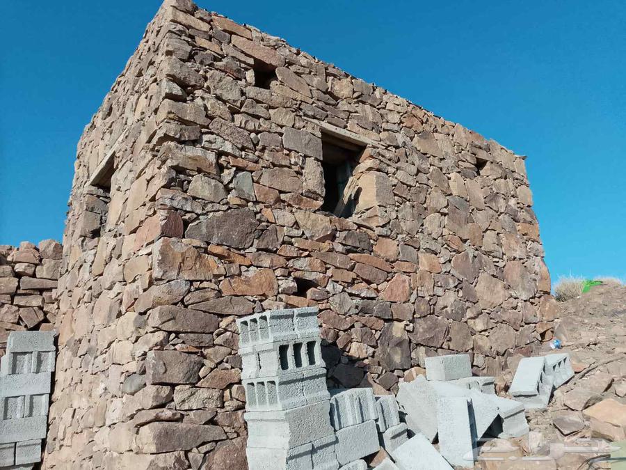 A teacher of stone barib wall with two walls dtabiley passages64459423711235110