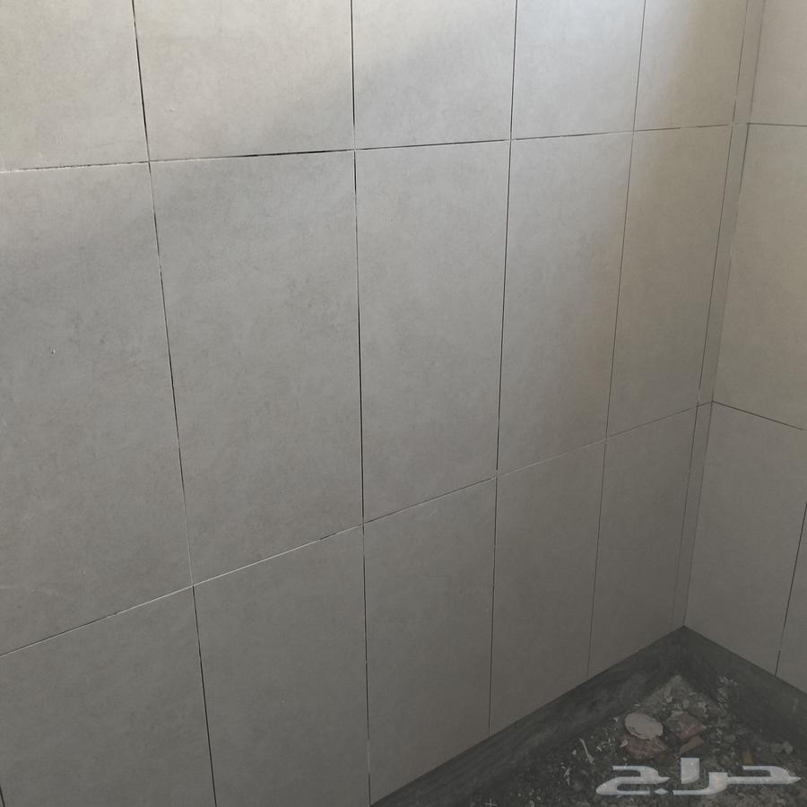 Marble and ceramic tile layer64459775563138113