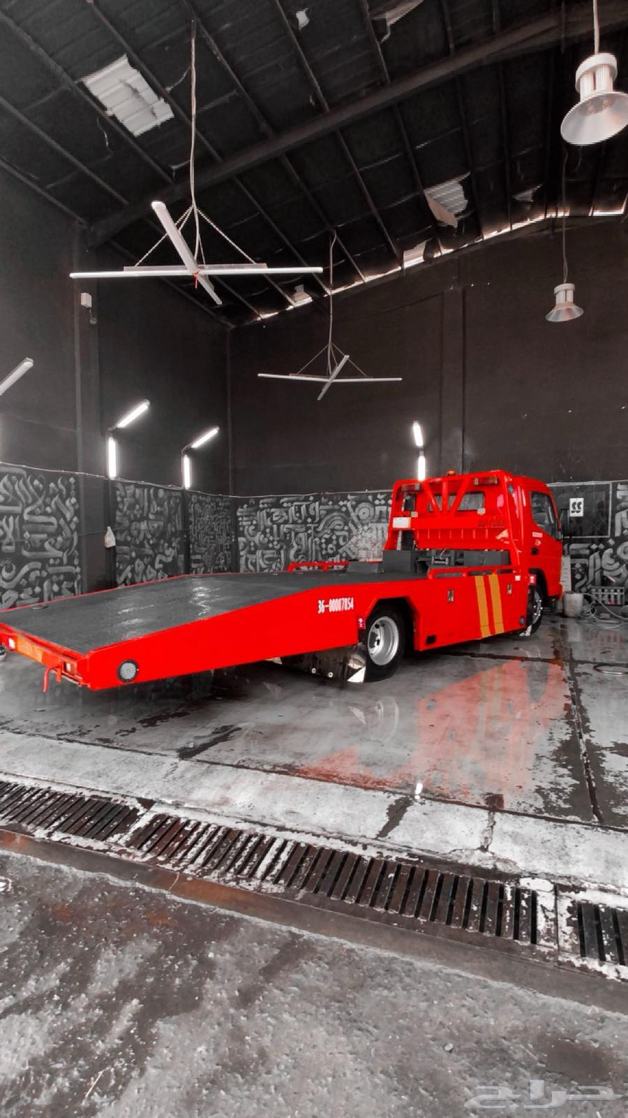 Towing Services and Rear Side of Aboha64473853092227110