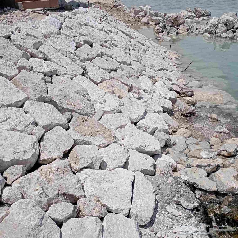 مقاول وتركيب الحجر الطبيعي تدبيش الحجر بحيرات وحواجز مائيه64473899250689114