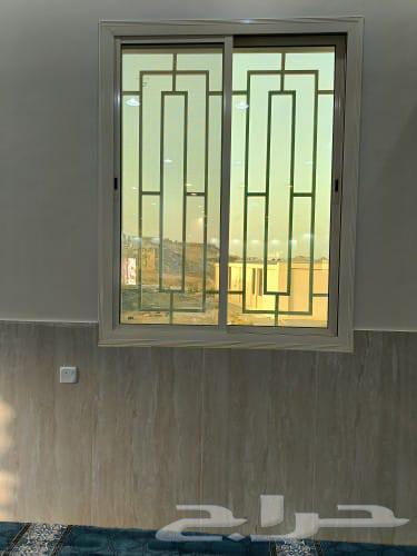 Aluminum window installation with double glazing at Seraia windows64473805616386112