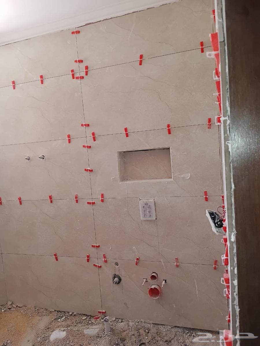 Ceramic tile layer, plastering, construction64474012571393110