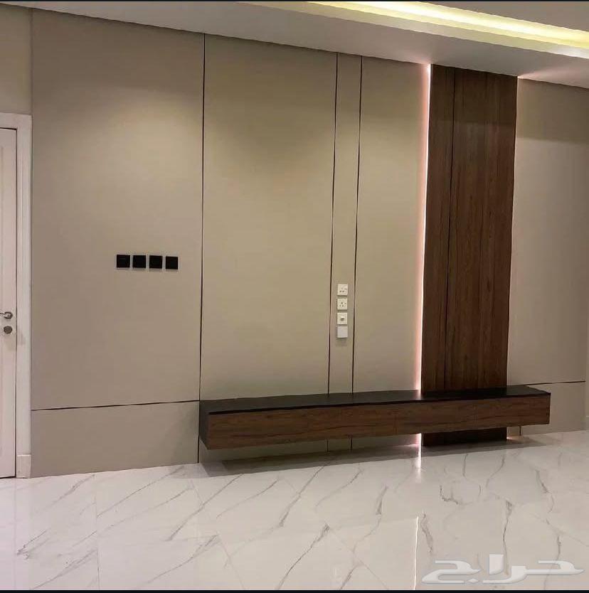 Wallpaper, paint, wood alternative, and marble installation64481401824385114