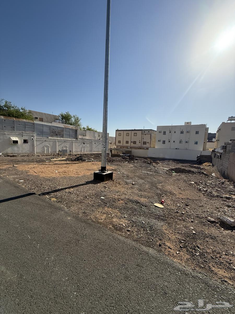 Land for sale in Al Rawbah (Al Zahra) Plot 580, three fronts64487069832065114