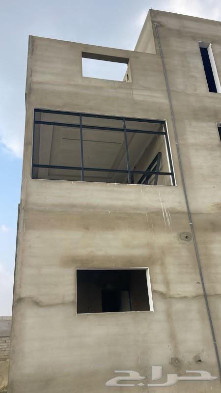 Tilted Glass Shop in Aseer with Balcony and Structure64481433734273114