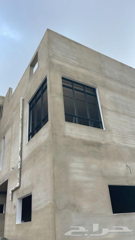 Tilted Glass Shop in Aseer with Balcony and Structure64481433734273113