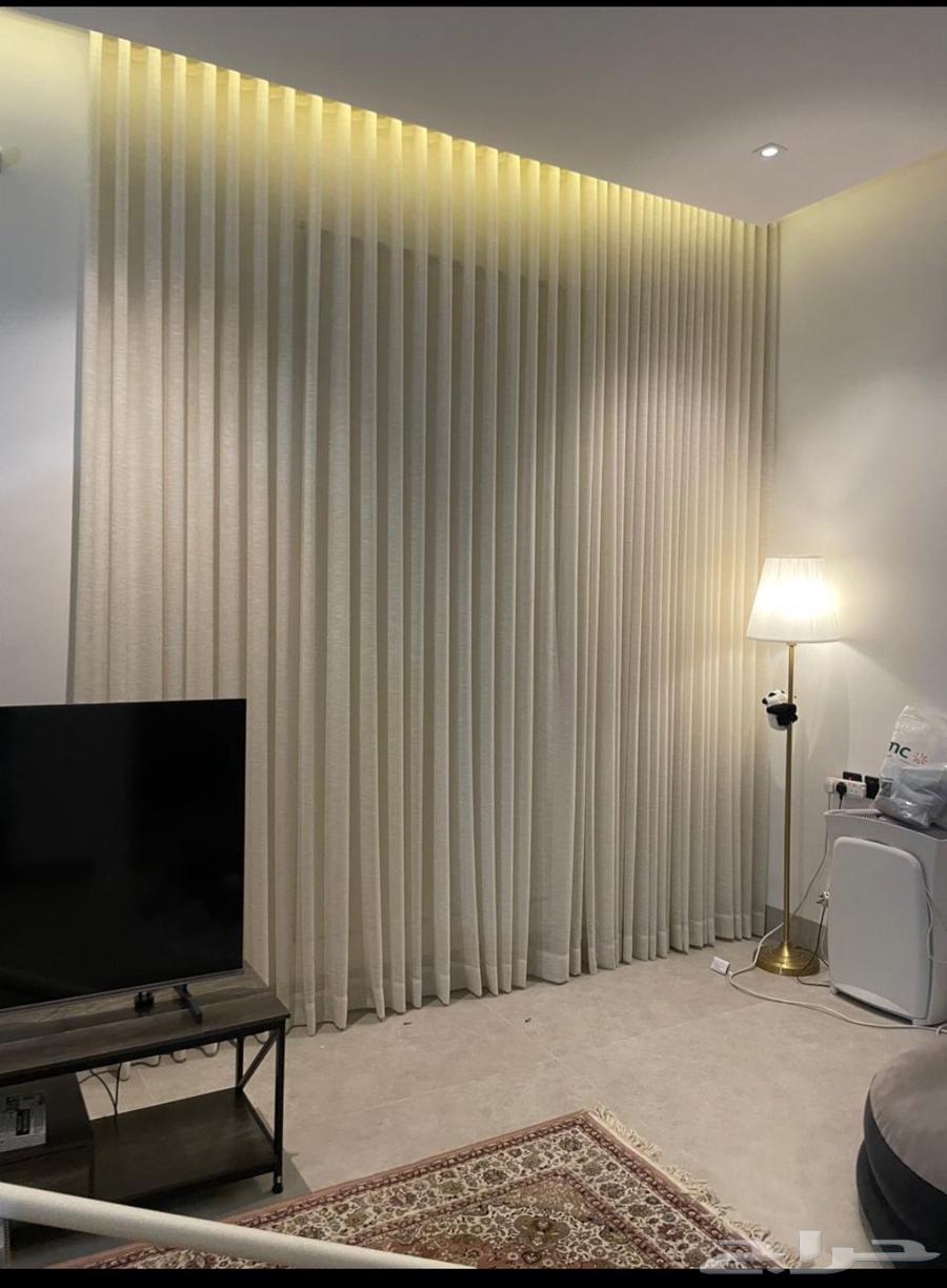 Custom curtains and sofa details64525021562370113