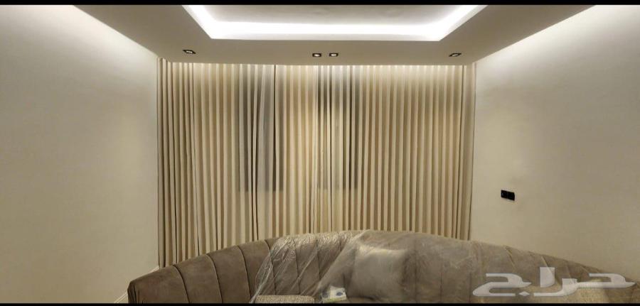 Custom curtains and sofa details64525021562370114