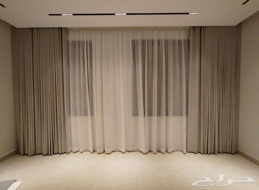 Custom curtains and sofa details64525021562370112