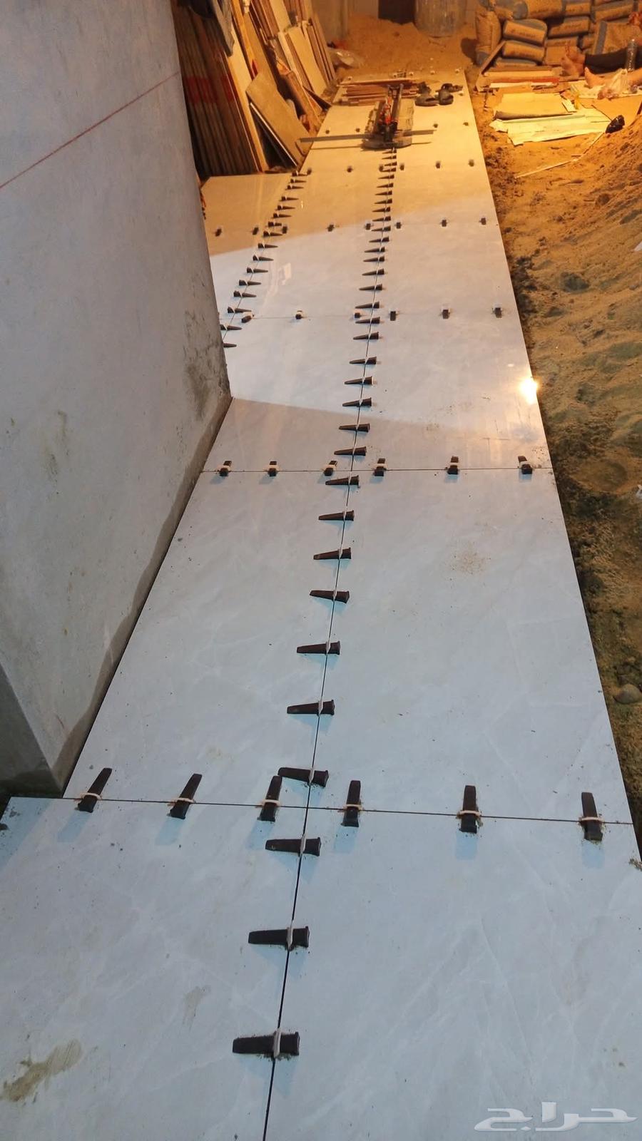 Tile installer, installing all types of tiles, ceramics, porcelain and marble panels, Turkish64572851115137114