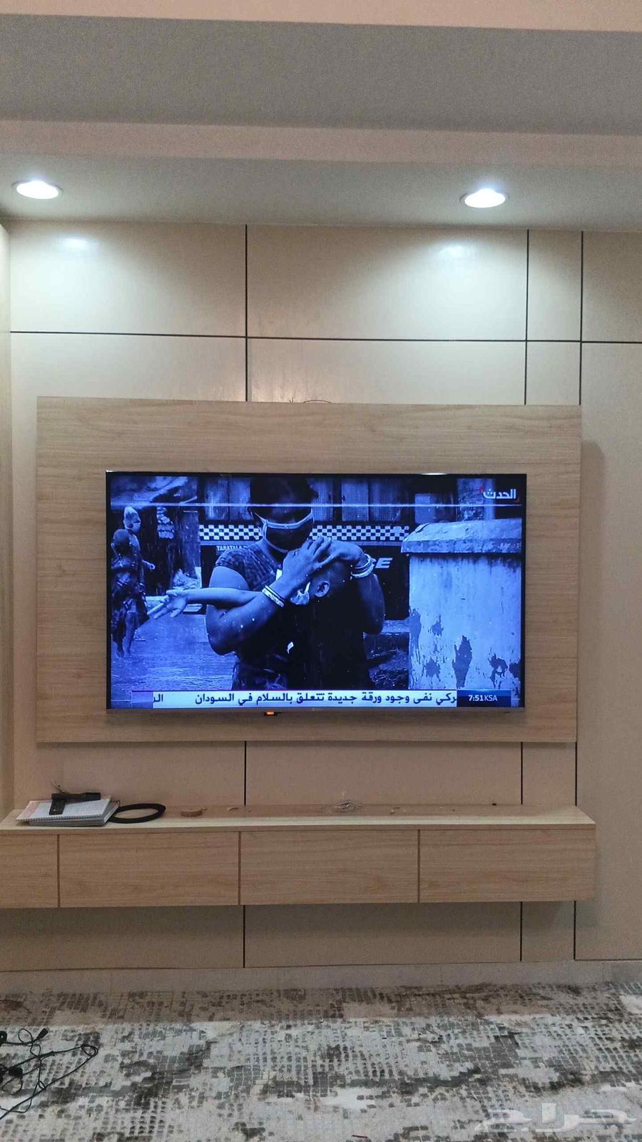 Satellite technician programming dish, installing screens and cameras, repairing all64563406225155110