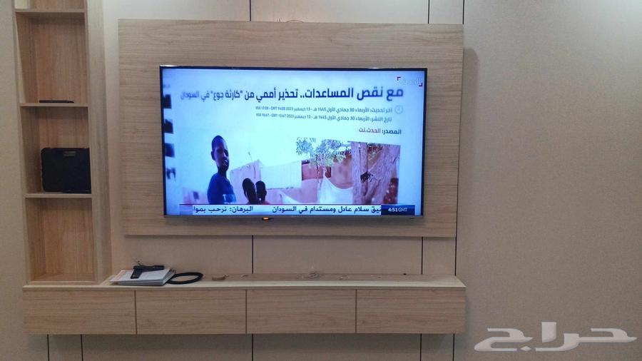 Satellite technician programming dish, installing screens and cameras, repairing all64563406225155111