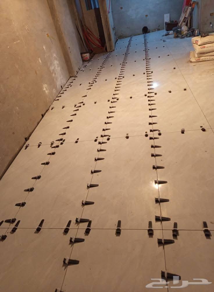 Tile installer, installing all types of tiles, ceramics, porcelain and marble panels, Turkish64572851115137111