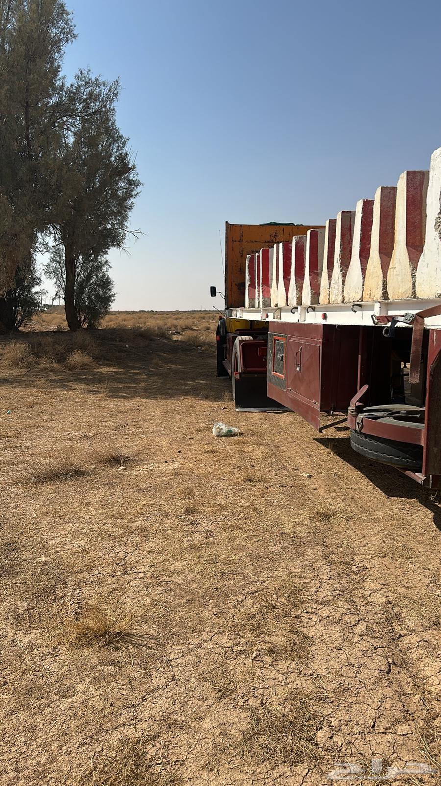 Flatbed trailer in Buraydah for transporting iron, sand, feed, and tiles64572965438337112