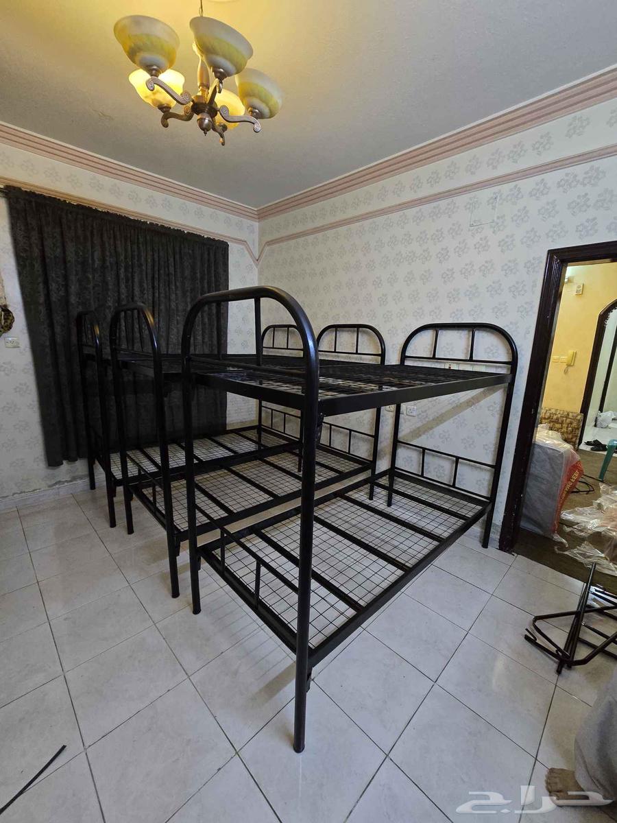 Preparing accommodation for workers: iron bed, iron wardrobe, mattresses, blankets, and pillow64589614533634112