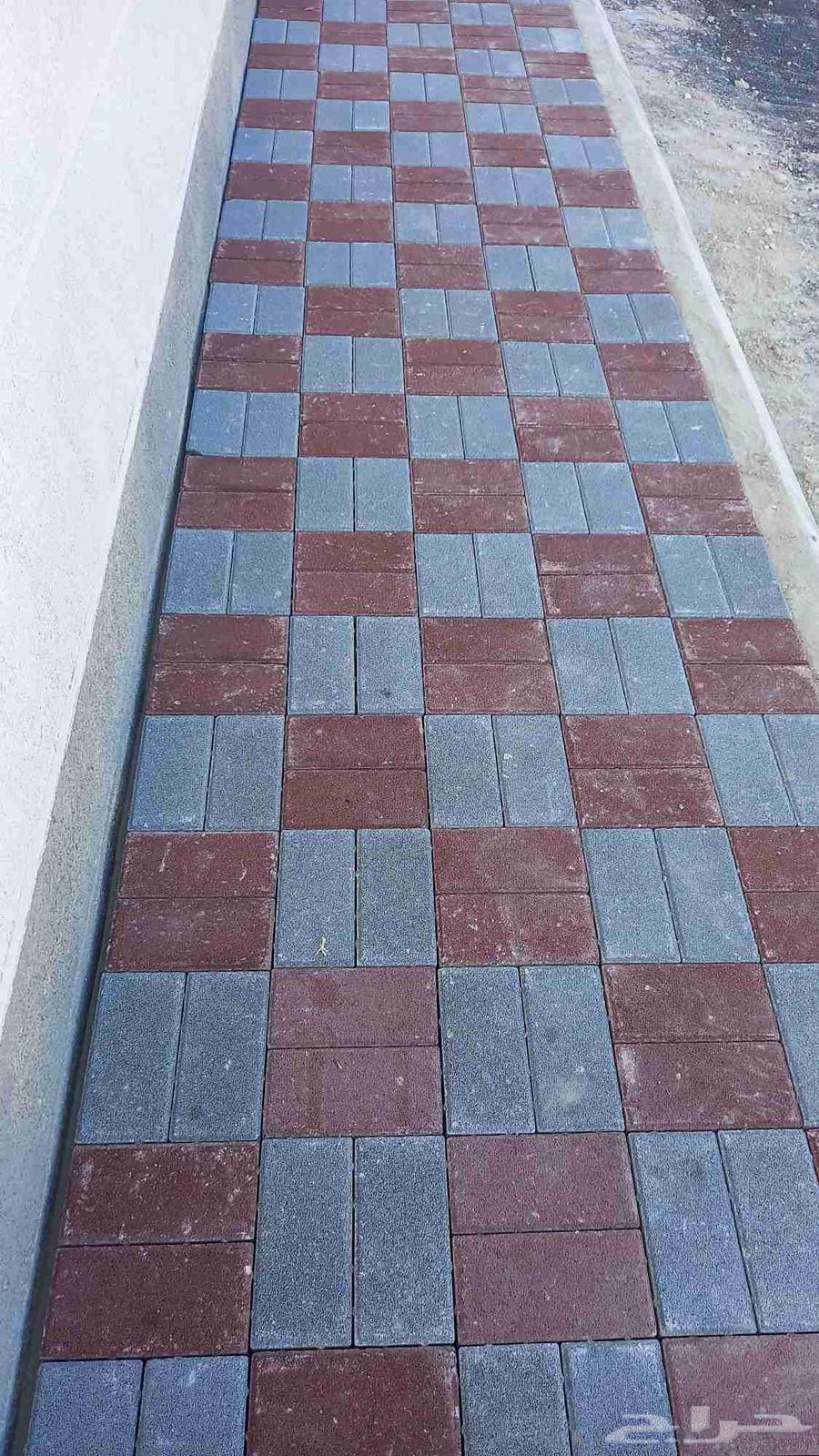 Installation of curbs and interlocking tiles64606446287746110
