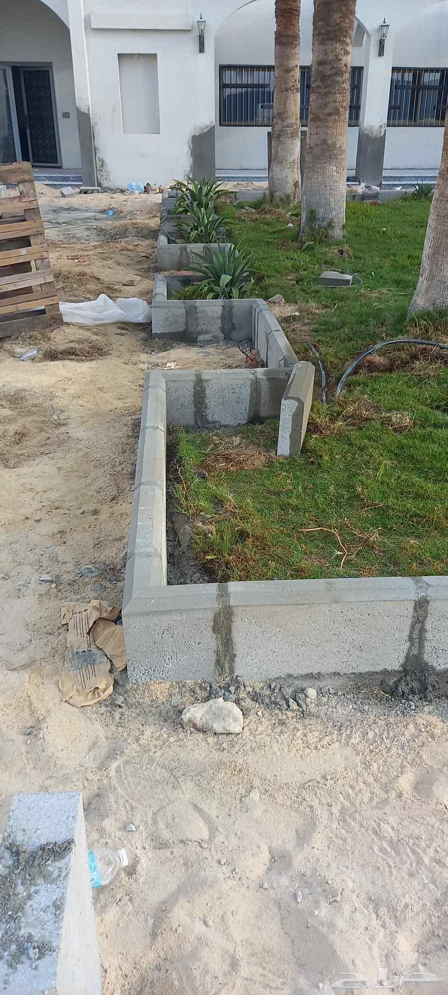 Installation of curbs and interlocking tiles64606446287746111