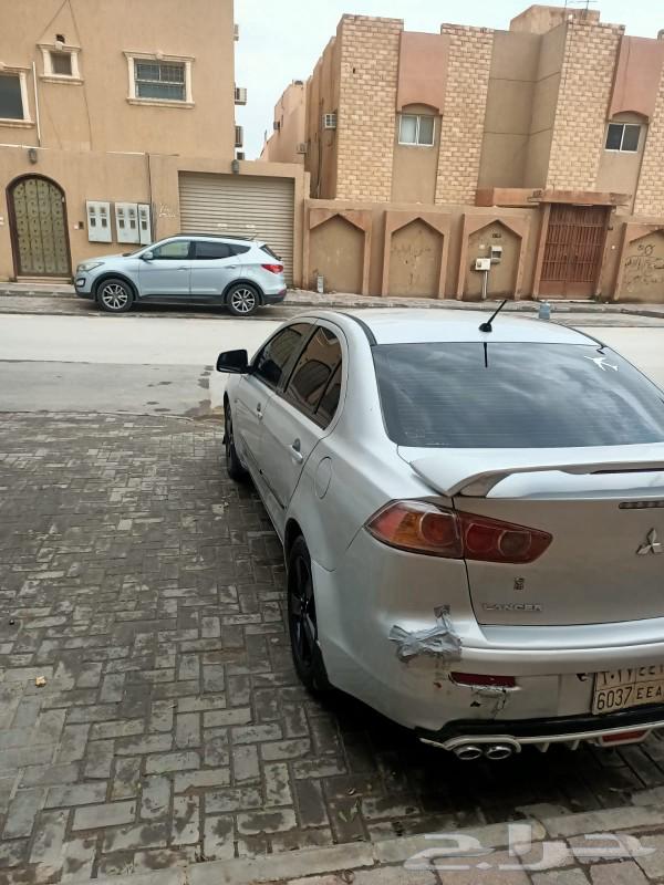 لانسر شارك السياره قير اوتوماتيك مكينه والقير على الشرط63328266599297112