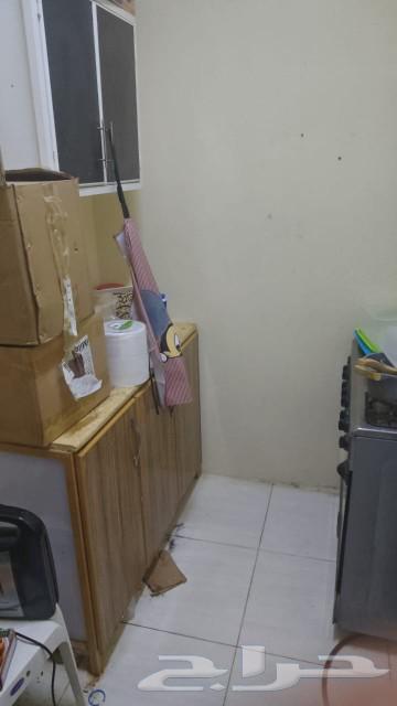 Bedroom with a loft, kitchen, and two split air conditioners63197877371394112