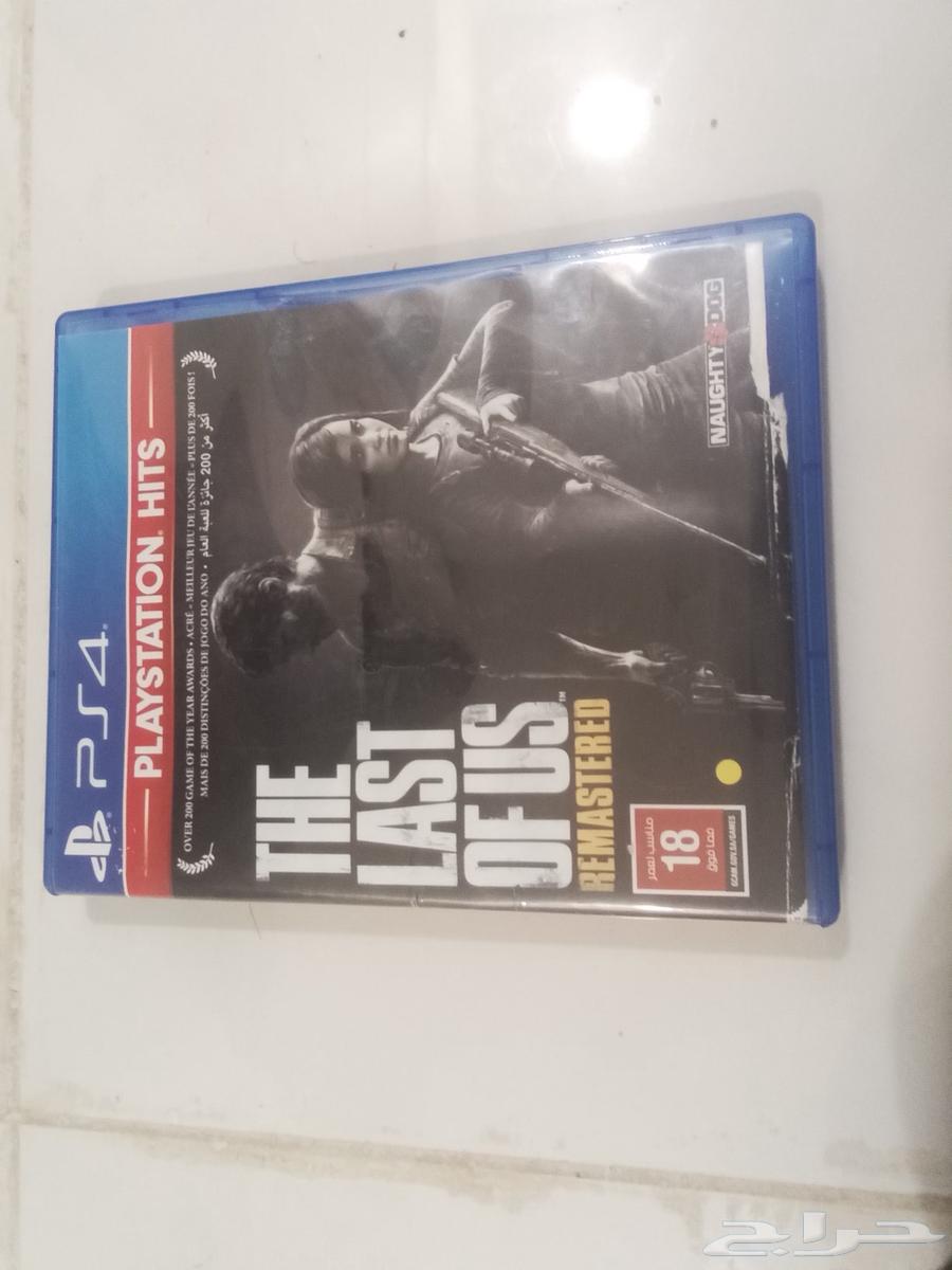 PlayStation 4 with controller and two game CDs63191841706626111