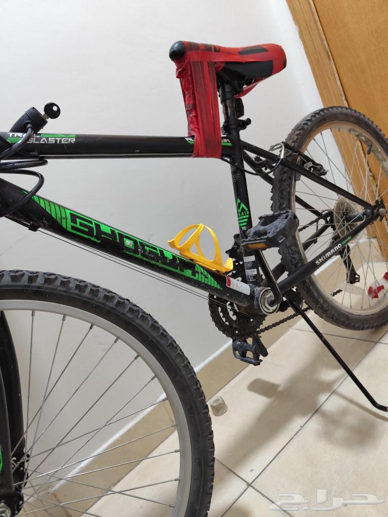 Speed bike with lock, bottle holder, horn, and phone holder.63248470060418113