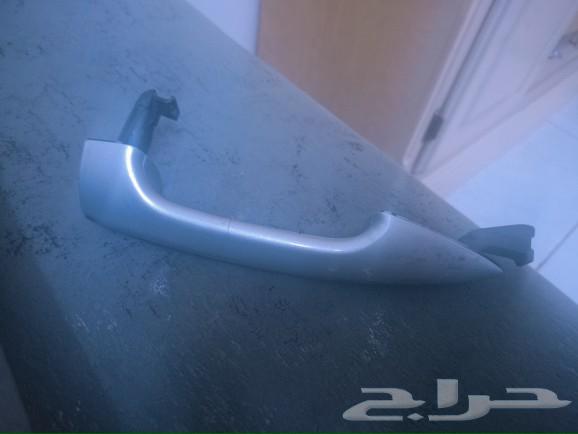 Right-side accent door handle. Original B180633651372839701116