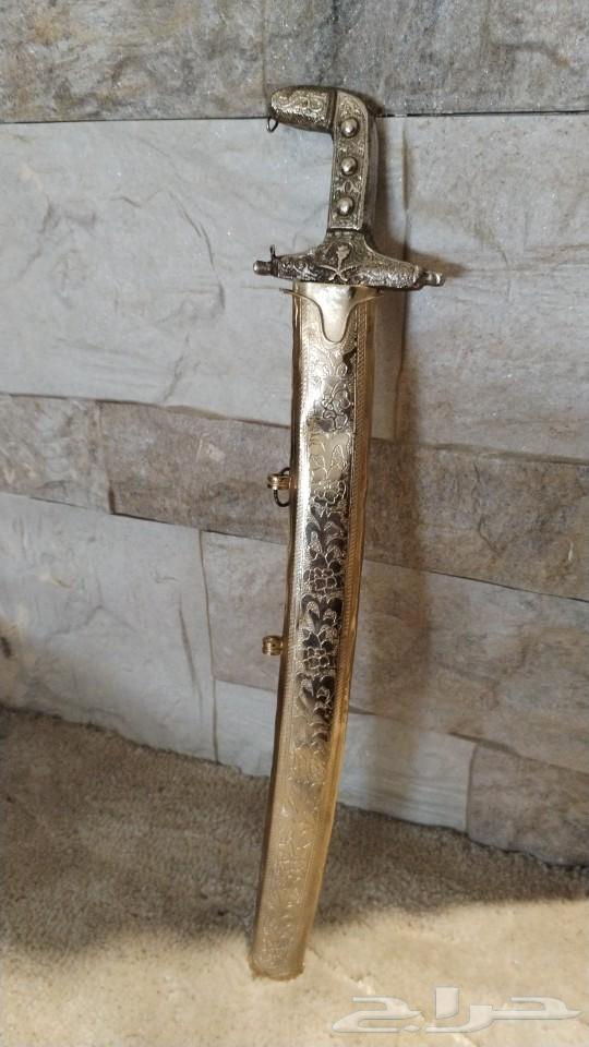 Sword and a rare watch63512057446787113
