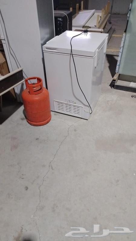Refrigerator, 58-inch smart TV, and a five-burner stove with oven.63493197832322113