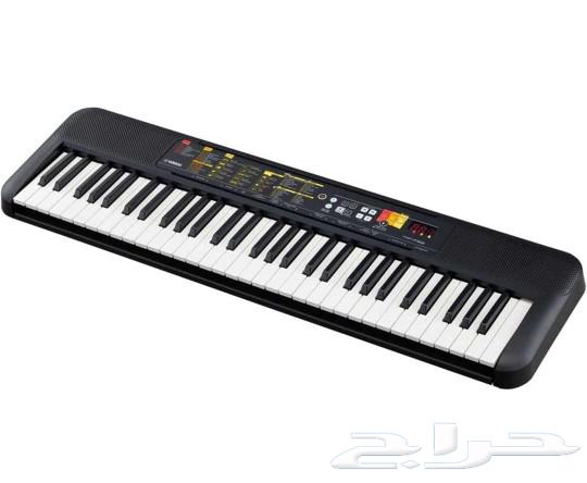 Yamaha PSR52 keyboard and Yamaha c40 guitar63117386917506119