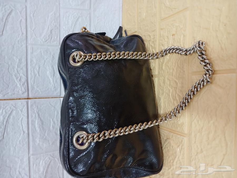 Original Arabic text: شنطه قوتشى اصلى حجم وسط  
Corrected Arabic (grammar/spelling): شنطة قوتشي أصلية حجم وسط  
Translated to English (en):  
Gucci original medium-sized bag63174080527363114