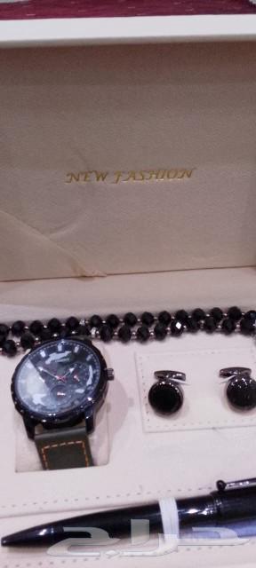 A set consisting of a watch, pen, tie clip, and prayer beads63174534287235112