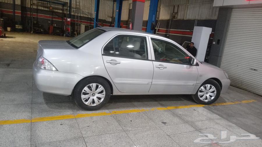 Lancer 2009 automatic, mileage one hundred thousand.632535302987551118