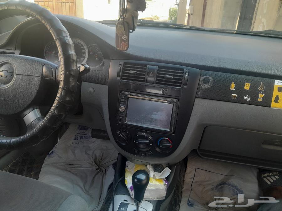 Optra sedan white 2007631373729889301115