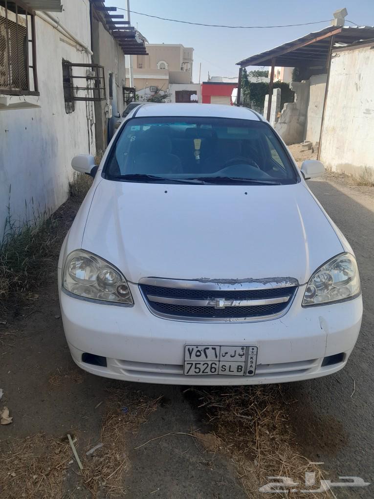 Optra sedan white 200763137372988930112